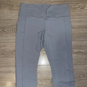 Athleta Salutation Stash Pocket 7/8 Tight